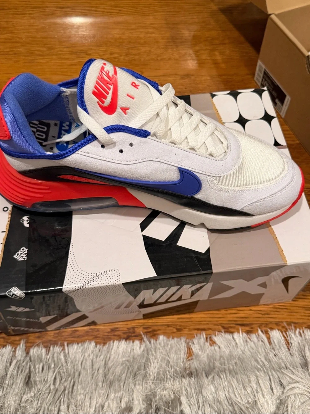 Nike Kids Air Max 2090 Sneakers in White, Black, Blue, Red